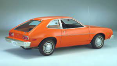 an orange vehicle: the Ford Pinto