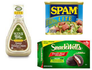 a group of food packages: Ken's Steak House dressing, spam, and SnackWell's Devil's Food Cakes